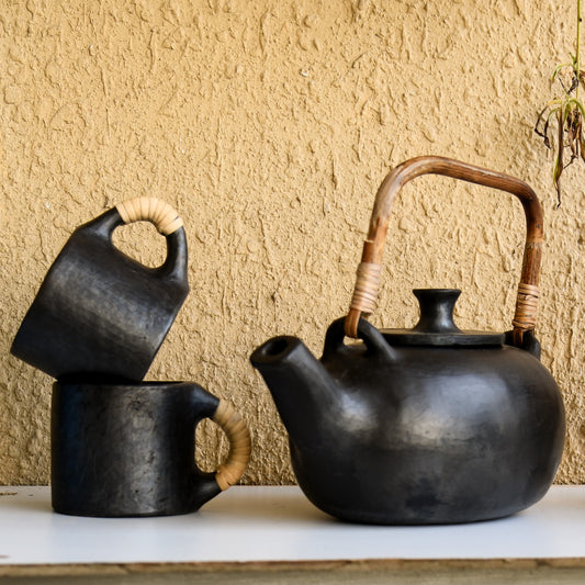 Black Pottery Kettle With Cane Handle